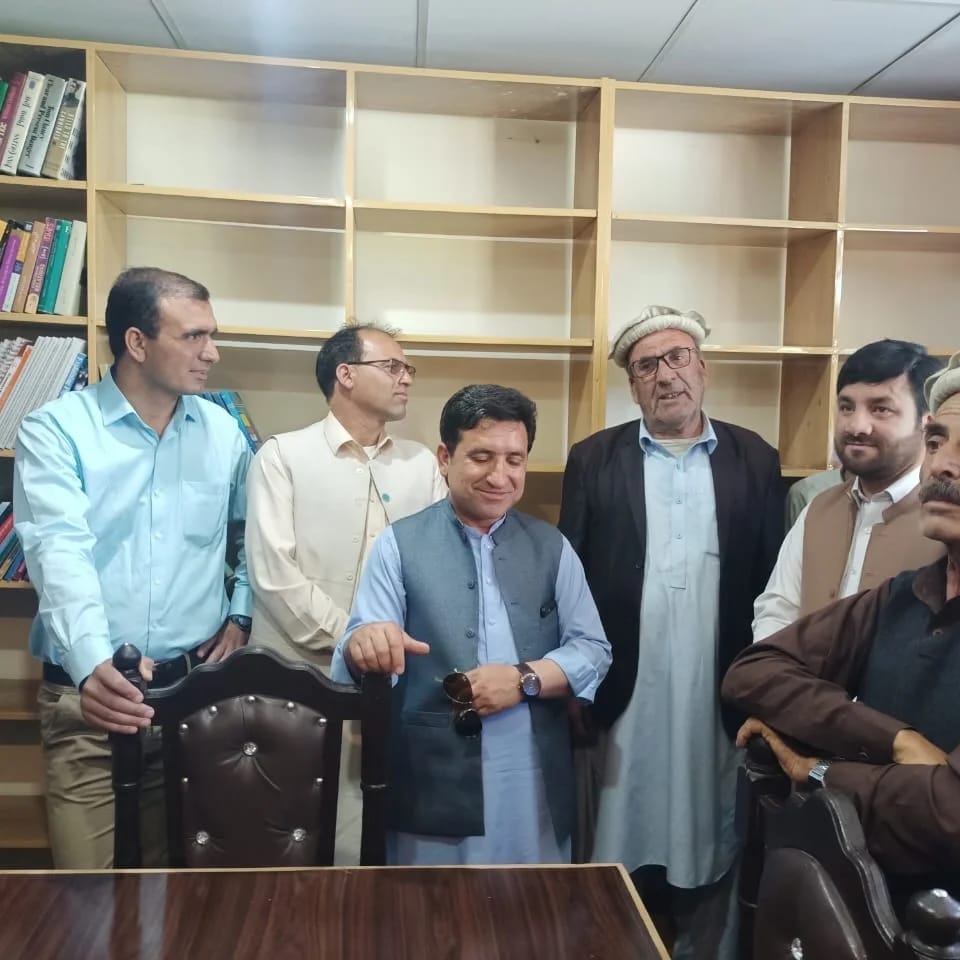 Community members visiting a library in Chitral