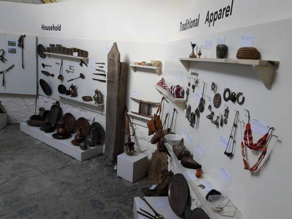 Museum exhibition of household and apparel items