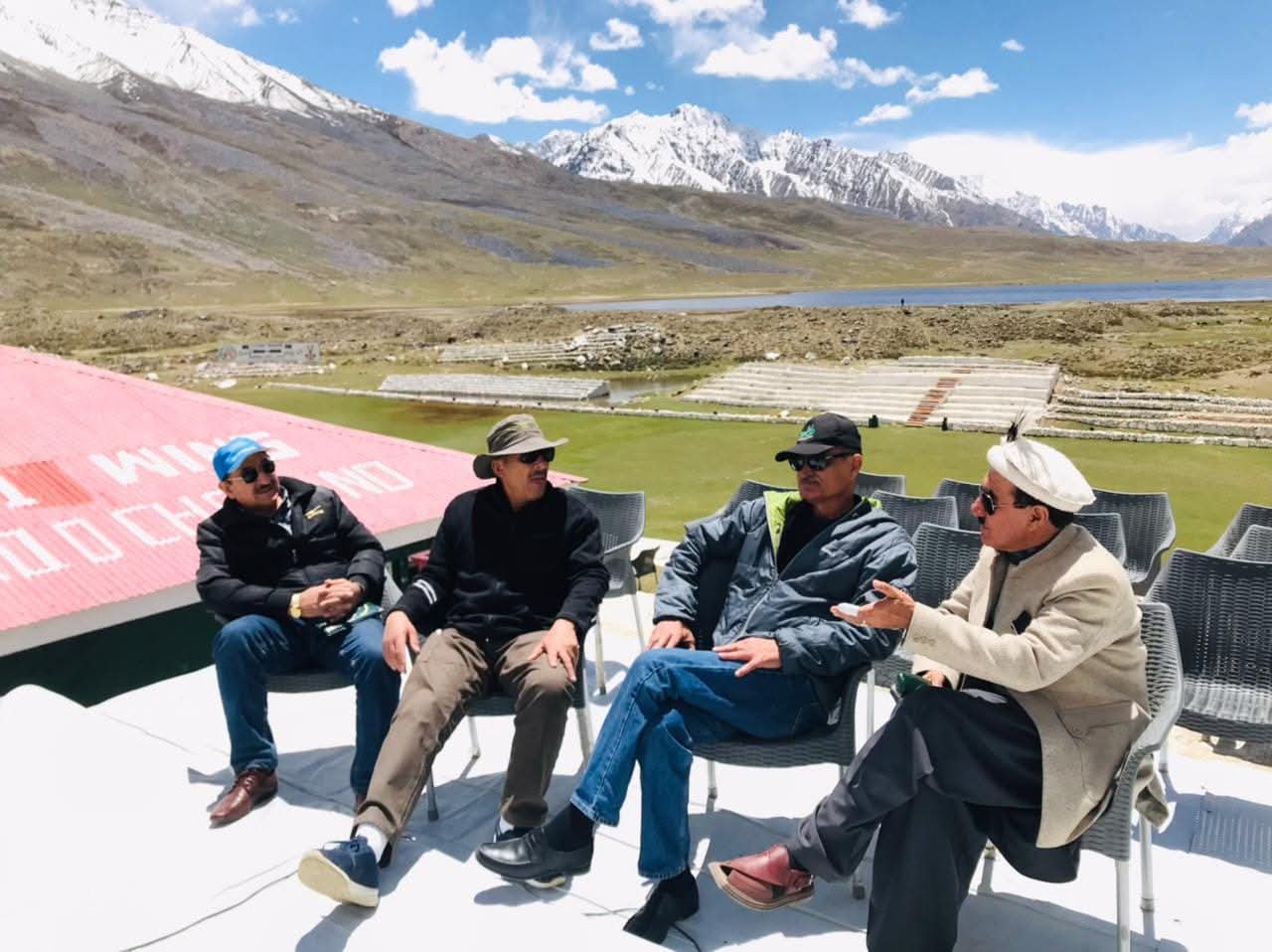 Shandur Polo Ground panorama with snow-capped Hindu Kush mountains and lake